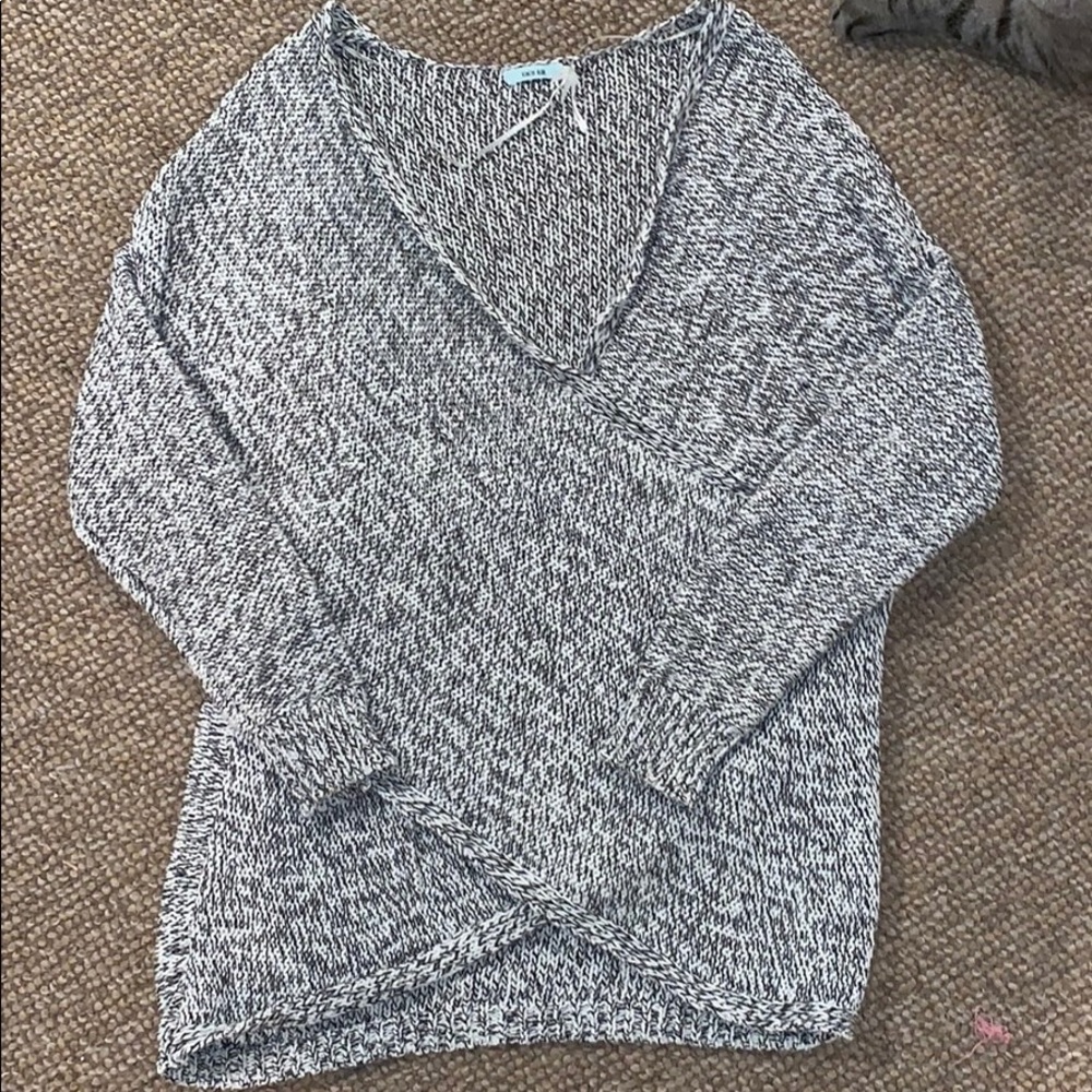Cross sweater